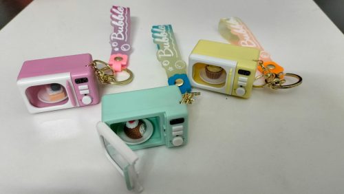 WhatsApp Image 2026-02-21 at 12.21.45 Mini Microwave Oven Keychain with LED Light and Realistic Sound Effects