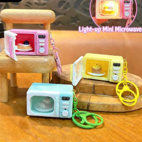 WhatsApp Image 2026-02-21 at 12.21.48 Mini Microwave Oven Keychain with LED Light and Realistic Sound Effects